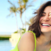 Anushka Sharma lights up as she poses in the pool in a neon green monokini