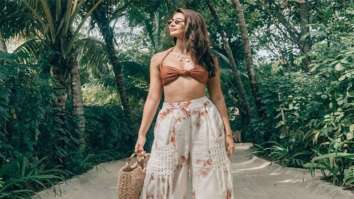 Pooja Hegde stirs a tropical storm in a brown bralette and a wide leg tie dye pants