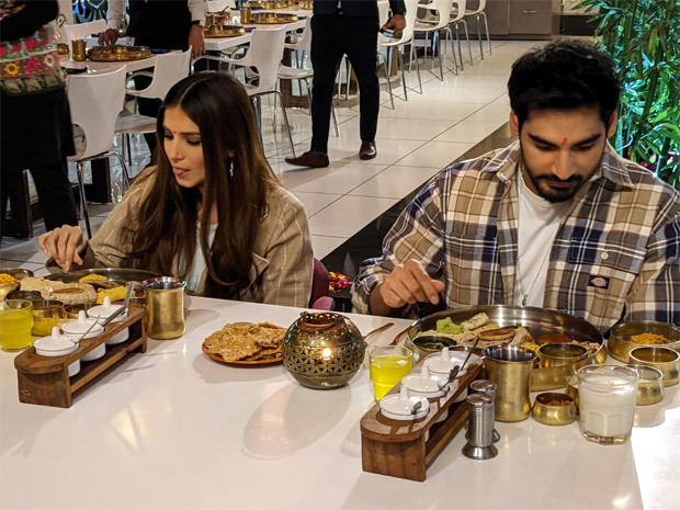 Tadap stars Ahan Shetty and Tara Sutaria relish Gujarati thali during promotions in Ahmedabad! Tadap stars Ahan Shetty and Tara Sutaria relish Gujarati thali during promotions in Ahmedabad!