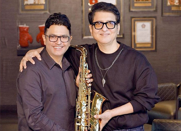 Bhushan Kumar gifts Sajid Nadiadwala a saxophone for creating a record of crossing 3 billion-plus views of 3 songs