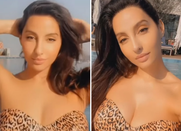 Nora Fatehi looks stunning in a leopard print bikini while relaxing in the pool in Dubai