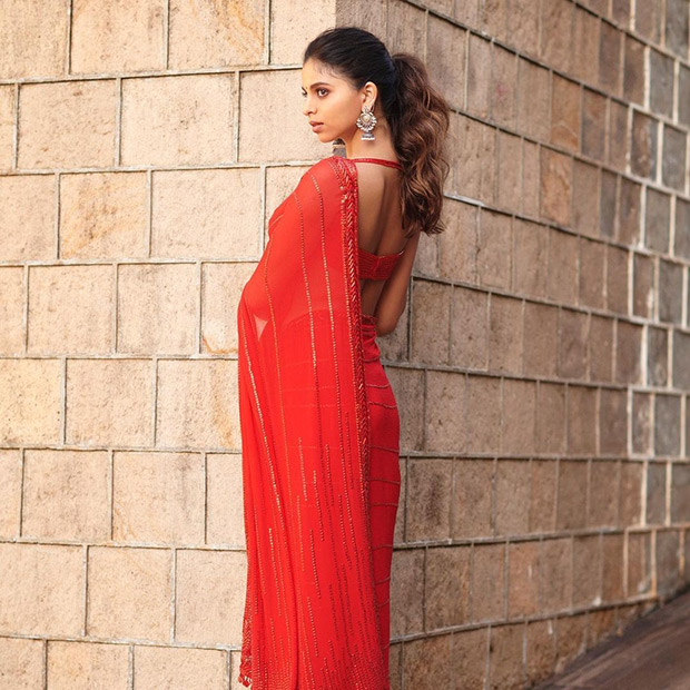 Suhana Khan is a vision in red as she stuns in a red Manish Malhotra saree; mother Gauri Khan reacts