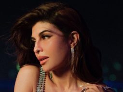 Jacqueline Fernandez strikes a glamorous pose in a crystal bralette and metallic skirt