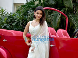 Photos: Alia Bhatt poses alongside a red antique car as she promotes her film Gangubai Kathiawadi