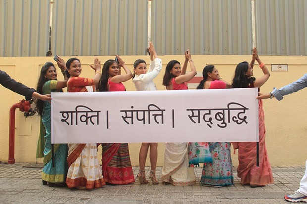 Alia Bhatt does the signature pose women at the special screening of Gangubai Kathiawadi on International Women's Day 2022 