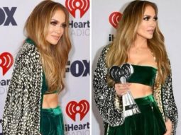 Jennifer Lopez flaunts her killer abs in Robert Cavalli emerald velvet bandeau top and pants at iHeartRadio Music Awards 2022