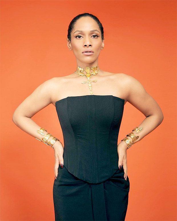 Masaba Gupta adds a dramatic twist to her all-black corset and skirt ensemble by accessorising it with gold jewellery Masaba Gupta adds a dramatic twist to her all-black corset and skirt ensemble by accessorising it with gold jewellery