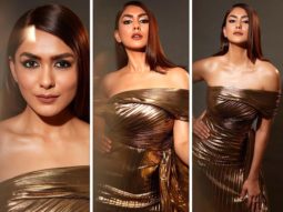 Mrunal Thakur exudes glamorous eminence in one-shoulder thigh-high slit gold metallic gown and fierce eyes