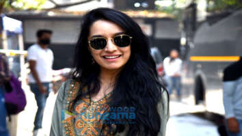 Photos: Shraddha Kapoor keeps it simple in a green top and blue denim with black shades as she gets spotted for a brand shoot in Worli