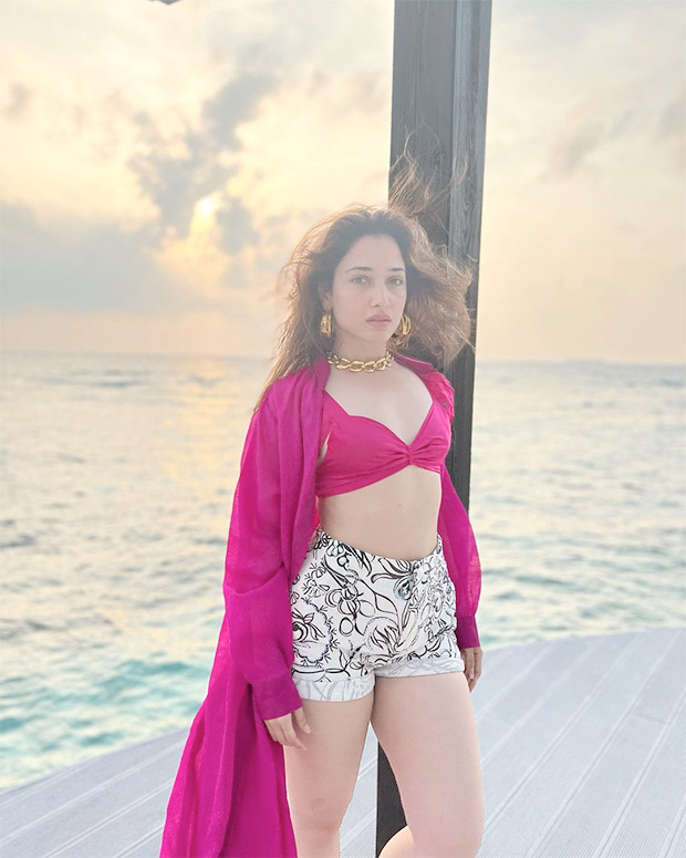 Tamannaah Bhatia exudes 'hot girl summer' vibes in pink bikini top, printed shorts and drape shrug in Maldives