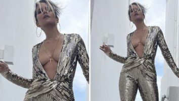 Halle Berry oozes glitz and glamour in stunning silver plunging neckline jumpsuit