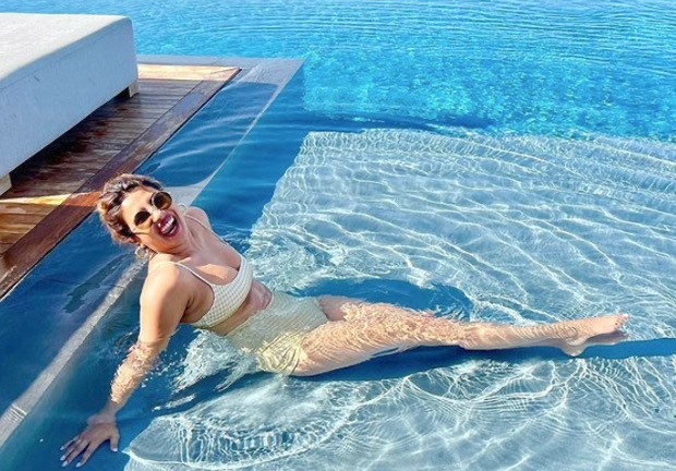 Nick Jonas says ‘damn’ as Priyanka Chopra beats the heat by sunbathing in her pool at her Los Angeles home in yellow bikini