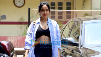 Photos: Neha Sharma waves at the paparazzi as she gets spotted after her gym workout