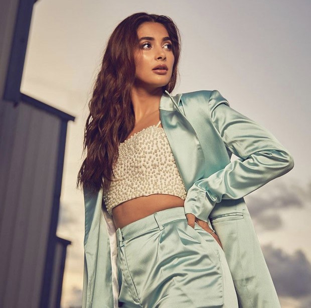 Pooja Hegde channels her inner boss babe vibe in satin pastel green pantsuit and pearl crop top worth Rs. 50,176 for Beast promotions