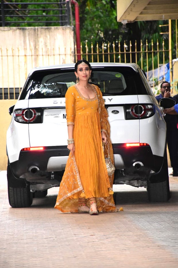 Ranbir Kapoor-Alia Bhatt Wedding: Karisma Kapoor looks resplendent in a mustard anarkali worth Rs. 65,000 by Punit Balan at mehendi ceremony