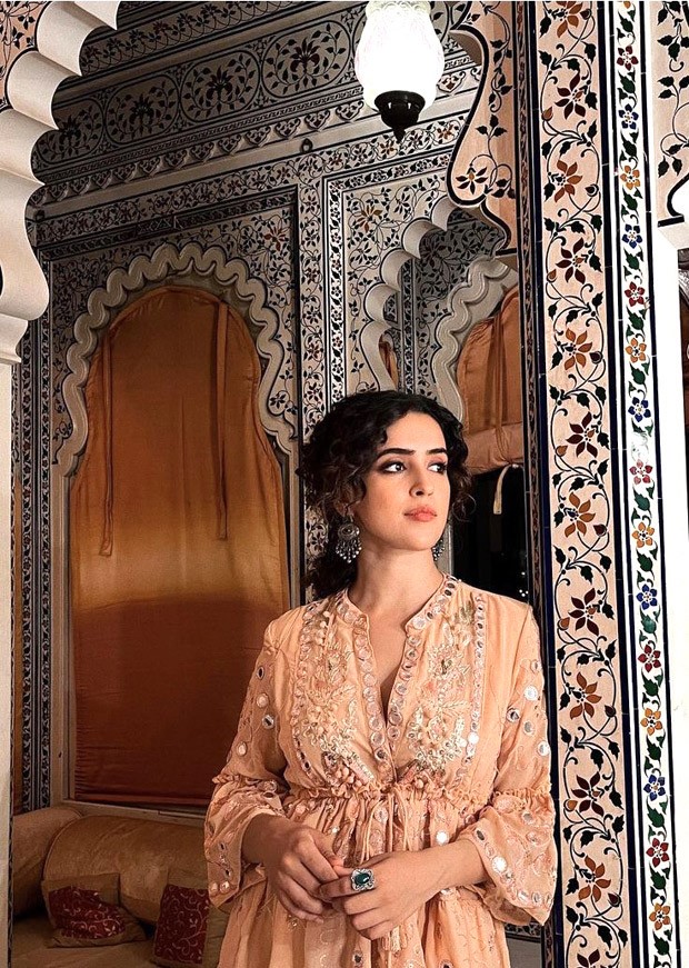 Sanya Malhotra is beauty personified in peach mirror embellished midi dress