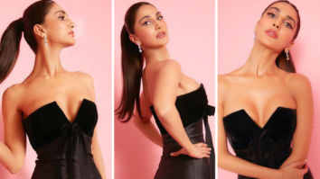 Vaani Kapoor proves black is always elegant in a strapless plunging neckline black ruffled midi dress