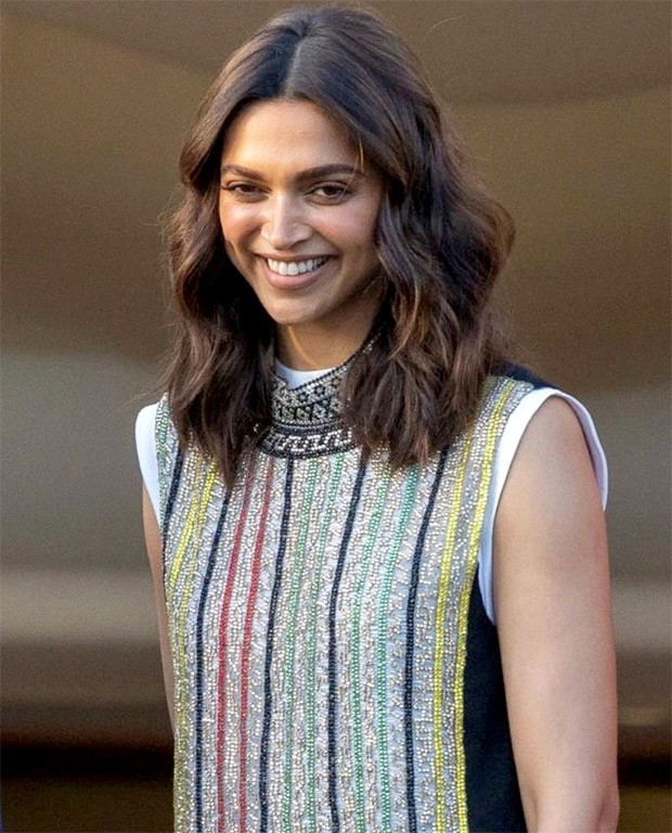 Cannes 2022: Deepika Padukone makes a statement in a multi-coloured striped Louis Vuitton dress for her first appearance as jury member