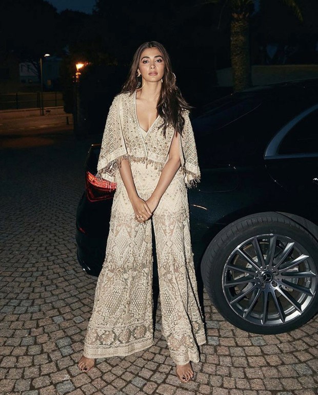 Cannes 2022: Pooja Hegde flaunts her style game in a cream jumpsuit and embellished cropped cape worth Rs. 3.3 lakh