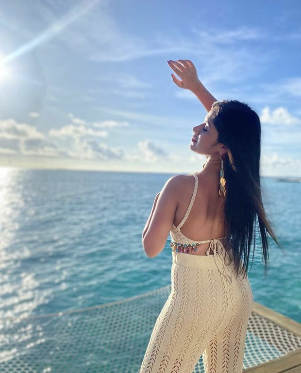 Jannat Zubair glows in a white crochet bralette and pants as she enjoys sunbathing by the pool in the Maldives