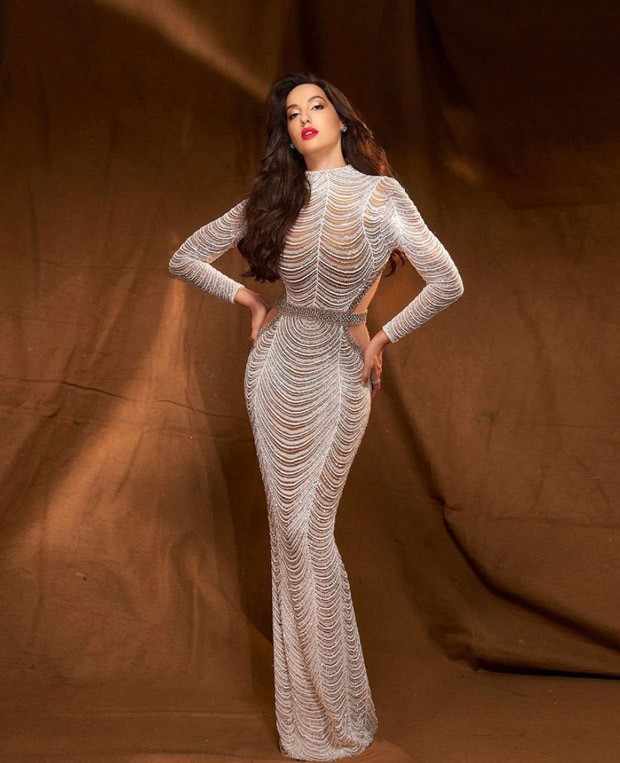 Nora Fatehi casts a spell in white shimmer bodycon gown worth Rs. 2.6 Lakh for Dance Deewane Juniors