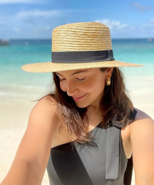 Anushka Sharma makes summer days hotter in chic black one-shoulder swimsuit and a straw hat