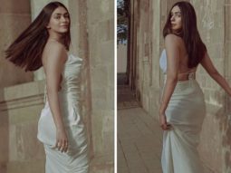 Mrunal Thakur looks pristine in white backless gown paired with Jimmy Choo fuchsia heels worth Rs. 69,545