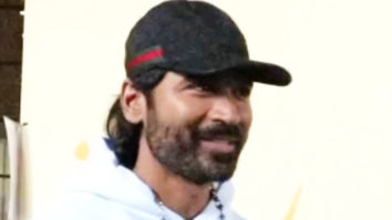 Dhanush spotted at airport, smiles at paps