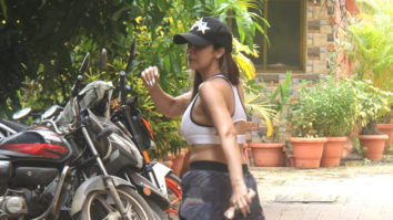 Malaika Arora looks fit in sporty wear as she smiles at paps