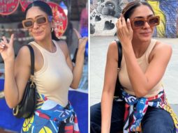 Mrunal Thakur rocks edgy street style look in beige camisole and denim pants as she strolls around Delhi Haat