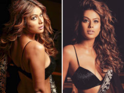 Nia Sharma in deep-neck black transparent saree and strappy blouse has us swooning