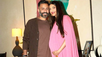 Parents-to-be Sonam Kapoor and Anand Ahuja pose for paps