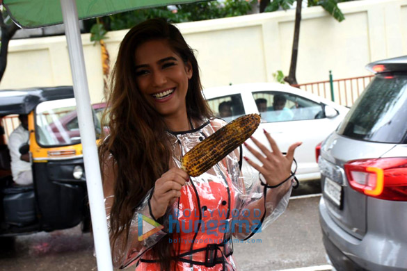 Photos: Poonam Pandey snapped enjoying corn in the rains Photos: Poonam Pandey snapped enjoying corn in the rains