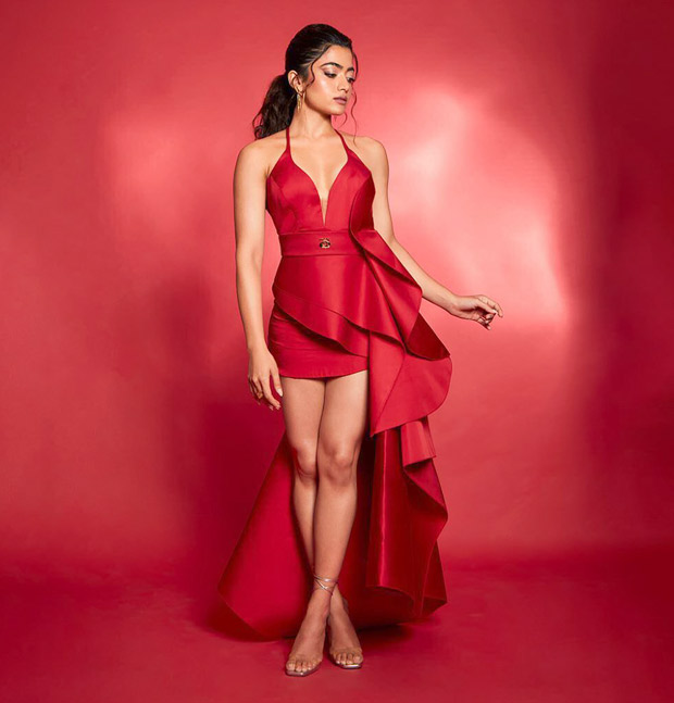 Rashmika Mandanna looks like a vision in red dress with plunging neckline and ruffled trail