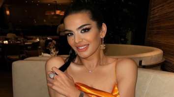 Sanjay Dutt’s daughter Trishala Dutt shares a smouldering picture in orange satin midi dress with cowl neckline