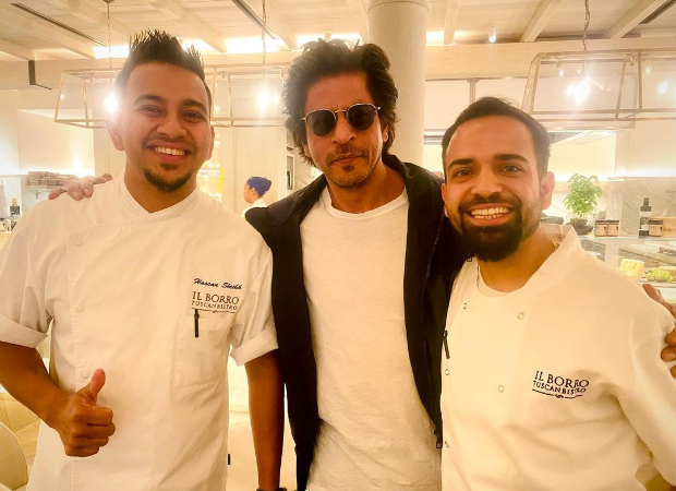 Shah Rukh Khan strikes a pose with two chefs in London amid Dunki shoot, see photos Shah Rukh Khan strikes a pose with two chefs in London amid Dunki shoot, see photos