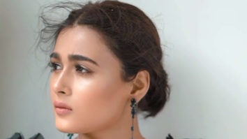 Shalini Pandey’s messy hair and black ruffles are a vibe