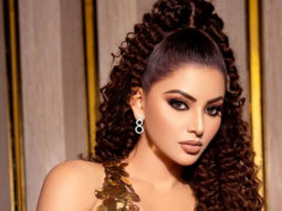 Urvashi Rautela looks stunning in the golden metallic gown