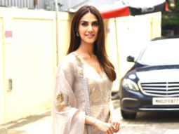 Vaani Kapoor smiles while posing at paps