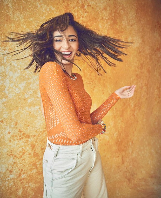Ananya Panday proves orange is the new black in backless mesh bodysuit and denim pants worth Rs. 21,113 for Liger promotions 