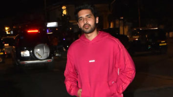 Armaan Malik poses for paps in a hot pink hoodie