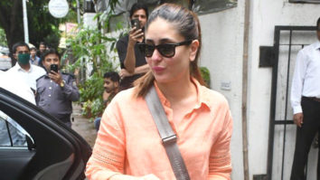 Kareena Kapoor Khan waves at paps in a trendy orange shirt