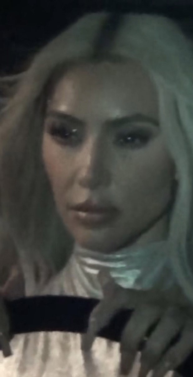 Kim Kardashian breaks the internet posting video of her Metallic cut-out monokini and futuristic sunglasses