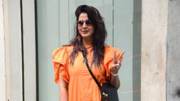 Kirti Kulhari rocks an orange outfit and blue hair