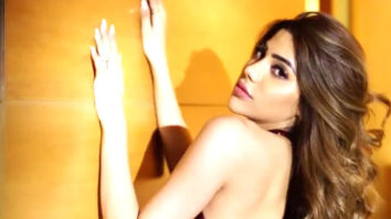 Nikki Tamboli dazzles in red shimmer outfit