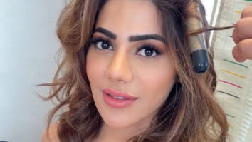 Nikki Tamboli looks graceful in orange outfit