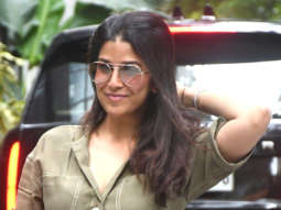 Nimrat Kaur smiles as she poses for paps