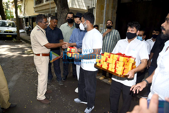 photos anand ahuja and anil kapoor distribute sweets to the media and police team 5