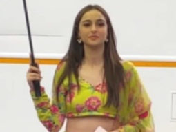 Sadia Khateeb flashes a cheerful smile as she poses in green lehenga
