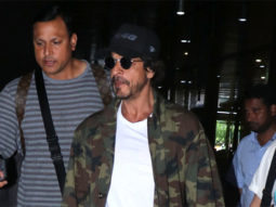 Shah Rukh Khan arrives at the airport sporting a cap
